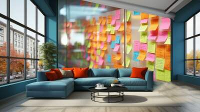 Blur color notes or sticky note on the glass wall in the office during brainstorming session in ideation workshop of design thinking Wall mural