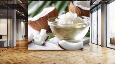 Coconut oil in a bowl on white background Also copra oil an edible oil extracted from the kernel of meat of mature coconuts harvested from the coconut palm Cocos nucifera Isolated macro photo Wall mural