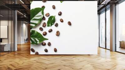 Coffee beans and leaves arranged on a white background with copy space image. Wall mural