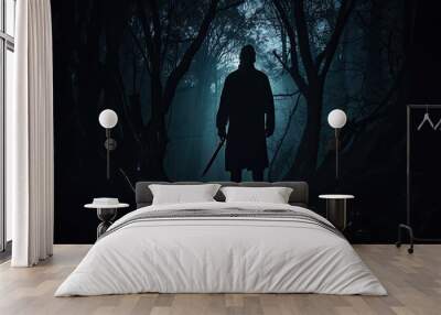 Dark forest at night with eerie silhouette and knife Wall mural