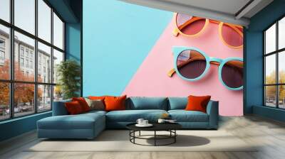 Fashionable summer theme with trendy sunglasses displayed in a flat lay style on pastel backgrounds is depicted in the copy space image Wall mural