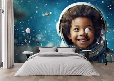 Happy little black boy with a homemade rocket playing astronaut with white handmade stars on a blue background Expressing childhood creativity and imag Wall mural