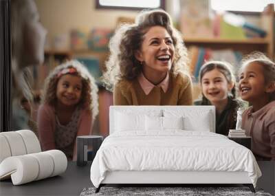 Happy primary school teacher holding a lesson to group of her students in the classroom. Creative Banner. Copyspace image Wall mural