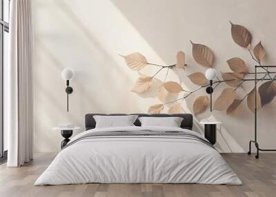 Leaves on a branch with a shadow against a white textured wall. silhouette concept Wall mural