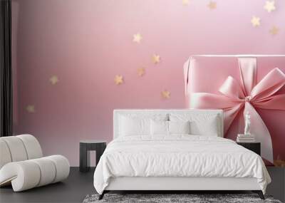 Pastel colored mockup with a gift golden ribbon and copy space Mother s day women s day or birthday celebration on a festive pink background Wall mural