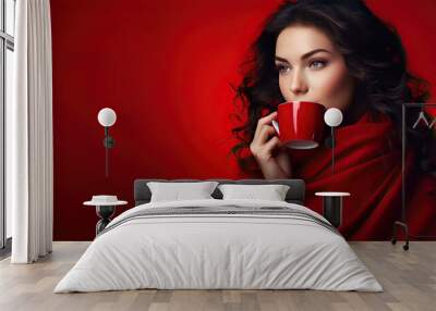 Red dressed woman sipping hot beverage on a red banner room for text Wall mural