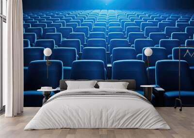 Rows of blue seats in a cinema hall providing seating for spectators Copy space image Wall mural