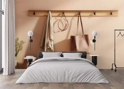 Stylish accessories and wooden hanger for keys on a beige wall in an interior hallway Wall mural