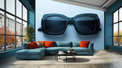 Stylish black plastic sunglasses showcased against a white background with copy space image Wall mural