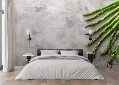 Top view of fresh asparagus on a concrete surface with copy space image Wall mural