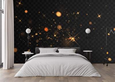 golden sparkling background design with light effect The gold dust and stars shine on a transparent background that can be separated. Wall mural