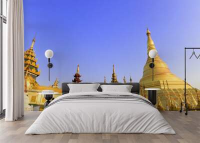 panorama view to the most famous and biggest Shwedagon pagoda with group of golden stupes beside in Yangon, Myanmar (Burma) Wall mural