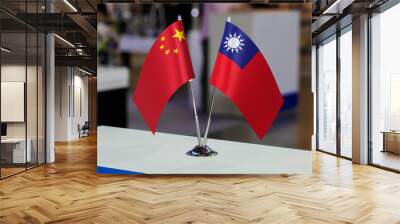 Flags of China and Taiwan together at some event or fair. Flags of the two countries as a symbol of cooperation between the two states. Joint business between Taiwan and China Wall mural