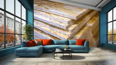 OSB sheets stacked in a hardware store. Construction material Wall mural