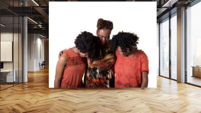 a mother and her 2 daughters praying isolated on white Wall mural