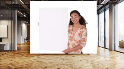 Young woman holding a poster board  Wall mural