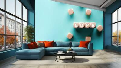 There is wood cubes with the word GDPR. It is an abbreviation for General Data Protection Regulation as eye-catching image. Wall mural