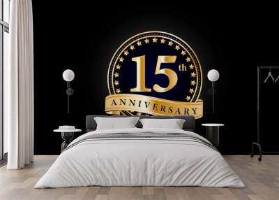 15th anniversary golden gold logo with gold ring and ribbon isolated on black background, vector design for celebration. Wall mural