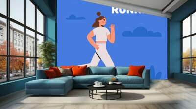 Young woman jogging Wall mural