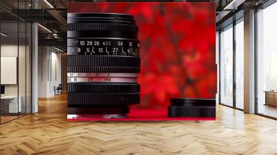 close up of a professional camera big lens in cinematic red background. Wall mural