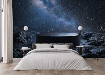 Black pumice podium on a backdrop of a starlit night sky, suitable for showcasing products in an otherworldly, cosmic setting Wall mural