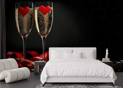 Elegant champagne glasses with red ribbon on a dark background celebrating a special occasion Wall mural