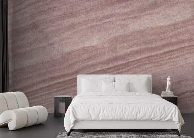 Texture of a stone wall with cracks and scratches which can be used as a backgr. The texture of the stone. Wall mural