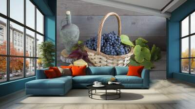 Grapes and cheese on a wooden table.  Wall mural