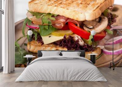 sandwich with ham vegetables and cheese with herbs. Wall mural