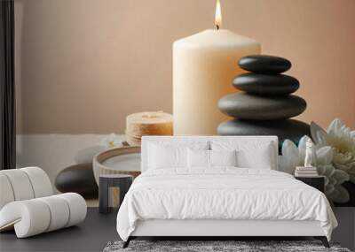 Zen stones, candles and white flower on beige background witn copy space, wellness and harmony, massage and bodycare, spa and wellness con Wall mural