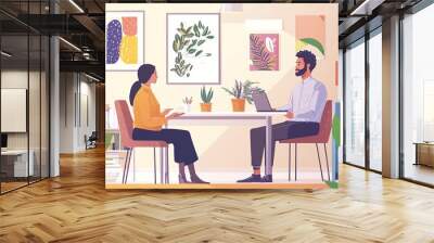 Two colleagues having a discussion in a modern office space with plants and artwork, creating a vibrant and creative atmosphere. Wall mural