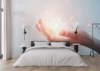 Close up hand of man holding illuminated light in white background. idea, innovation, thinking, and inspiration for business concepts. Cyber digital data idea. Wall mural