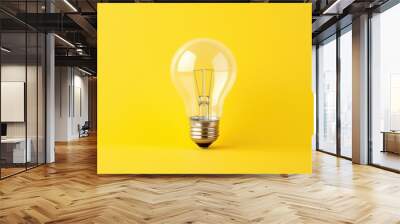 Education concept image. Creative idea and innovation. light bulb metaphor over yellow  background Wall mural