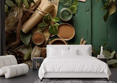 Flat lay of creative architect moodboard green and brown colors composition with samples of building, textile and natural materials and personal accessories. Top view, green background, template. Wall mural