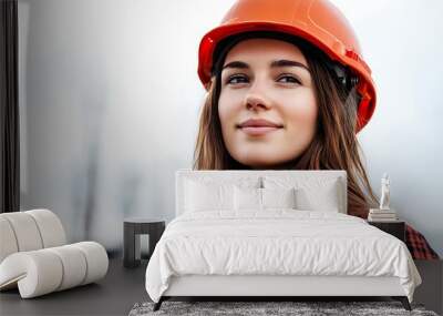 Female engineer in protective helmet and safety vest working at construction site Wall mural