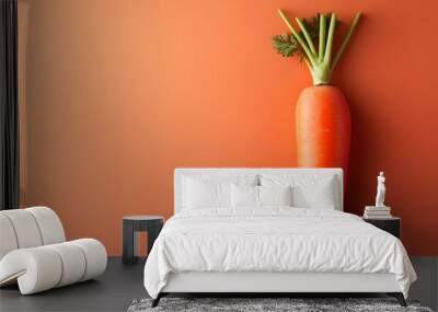 A single fresh orange carrot stands out against a vibrant orange background, showcasing minimalist food photography with sharp focus and vivid colors in a clean design. Wall mural