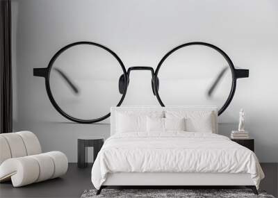 Black frame glasses on a white background, close up product photography in a studio with light. Wall mural