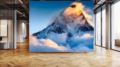 Photo of K2 mountain peak in the Himalayas. clouds swirling around it during golden hour lighting against a blue sky background.  For skincare, beauty, e-commerce, Cover, Poster, Banner, PPT, KV desig Wall mural