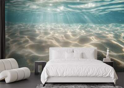 Underwater sand ripples, crystal clear shallow water, sunlight reflections, beach sand texture, transparent waves, soft beige tones, aquatic light patterns, serene coastal scene. Wall mural