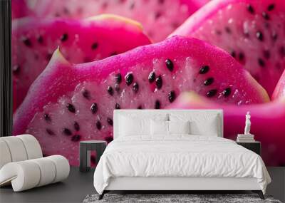 Vibrant close-up of dragon fruit, macro photography, vivid pink exterior, white flesh with black seeds, tropical produce, even studio lighting, food photography. Wall mural