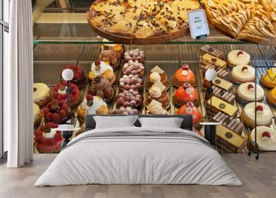 french pastries on display a confectionery shop Wall mural