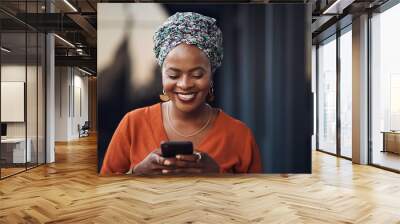 Black woman, happiness and phone text with online communication and networking. Happy, smile and female business employee on a mobile with social media and internet scroll reading a web message Wall mural