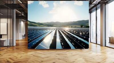 Renewable Energy - A solar farm with rows of panels reflecting sunlight against a backdrop of hills and sky. Wall mural