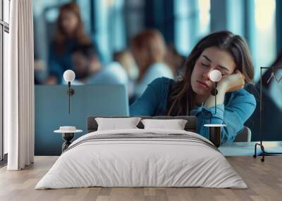 Tired Employee Sleeping at Office Desk. Exhausted Woman Resting in Workplace Environment Wall mural