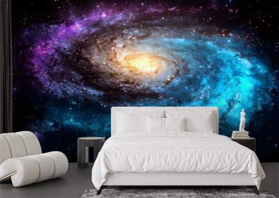 A Stunning Cosmic Spiral Galaxy with Vibrant Blue and Purple Hues in Deep Space Wall mural