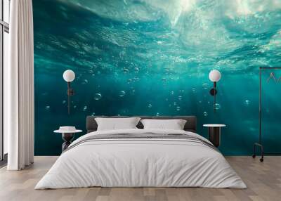 Underwater View of Bubbles Rising Through the Ocean Water with Sunlight Streaming Through Wall mural