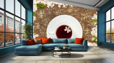 Cup of fruit tea and cherry blossom Wall mural