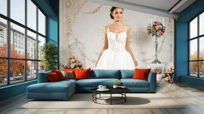 Model posing in a beautiful wedding dress Wall mural