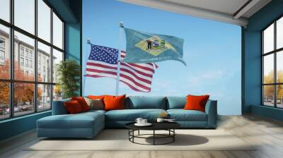 Waving flags of the USA and the US state of Delaware against blue sky backdrop. 3d rendering Wall mural