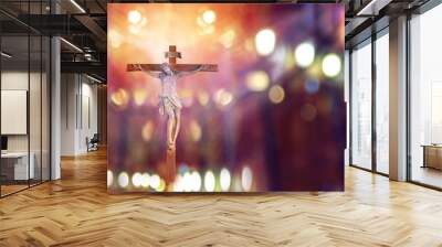 crucifix, jesus on the cross in church with ray of light from stained glass, easter festival of the Christian Church Wall mural